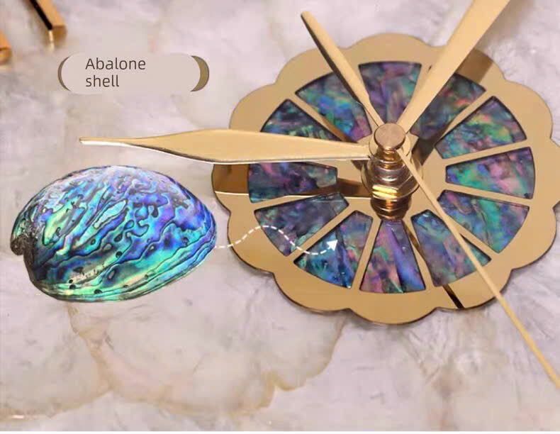Đồng hồ máy Quartz kim trôi tĩnh âm mặt số khảm vỏ trai thiên nhiên độc bản.