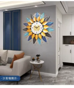 Đặt đồng hồ trang trí lá vàng mạ điện làm quà tân gia ý nghĩa. Máy kim trôi tĩnh âm bền bỉ