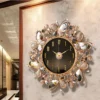 Khám phá mẫu đồng hồ decor phòng khách luxury phong thủy. Chất liệu kim loại mạ vàng phối cánh bướm xà cừ lấp lánh